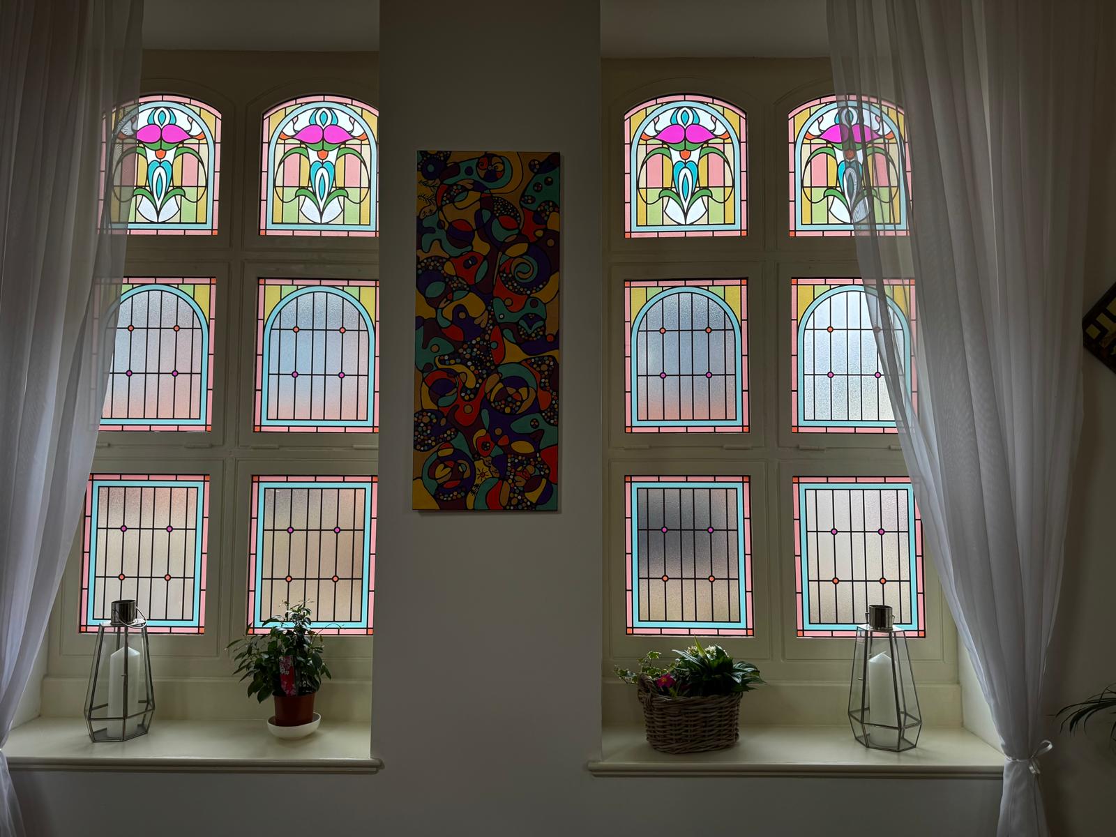 4 sets of bespoke maureen stained glass window film.jpeg