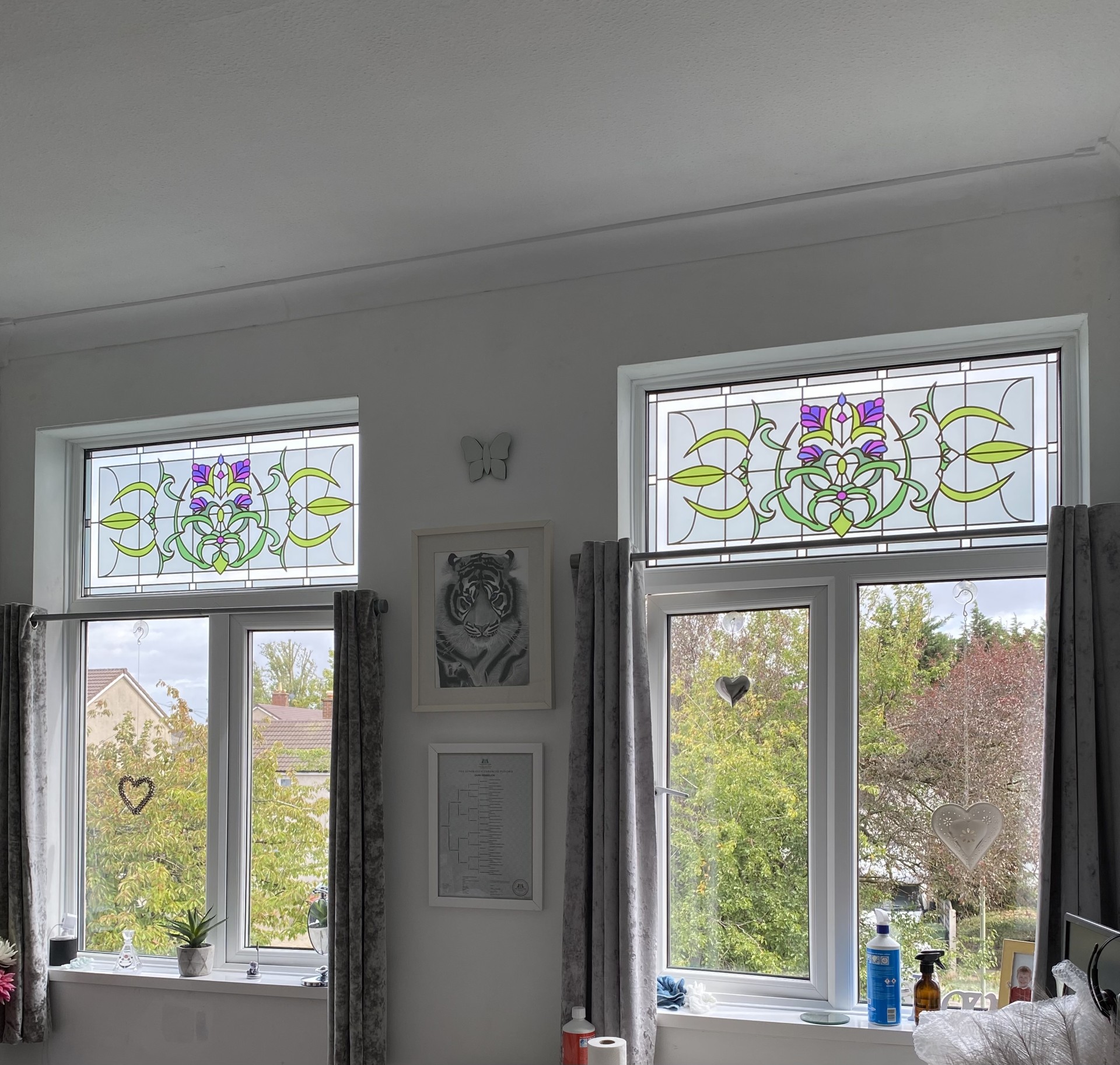 cynthia stained glass film installed on top windows.jpg