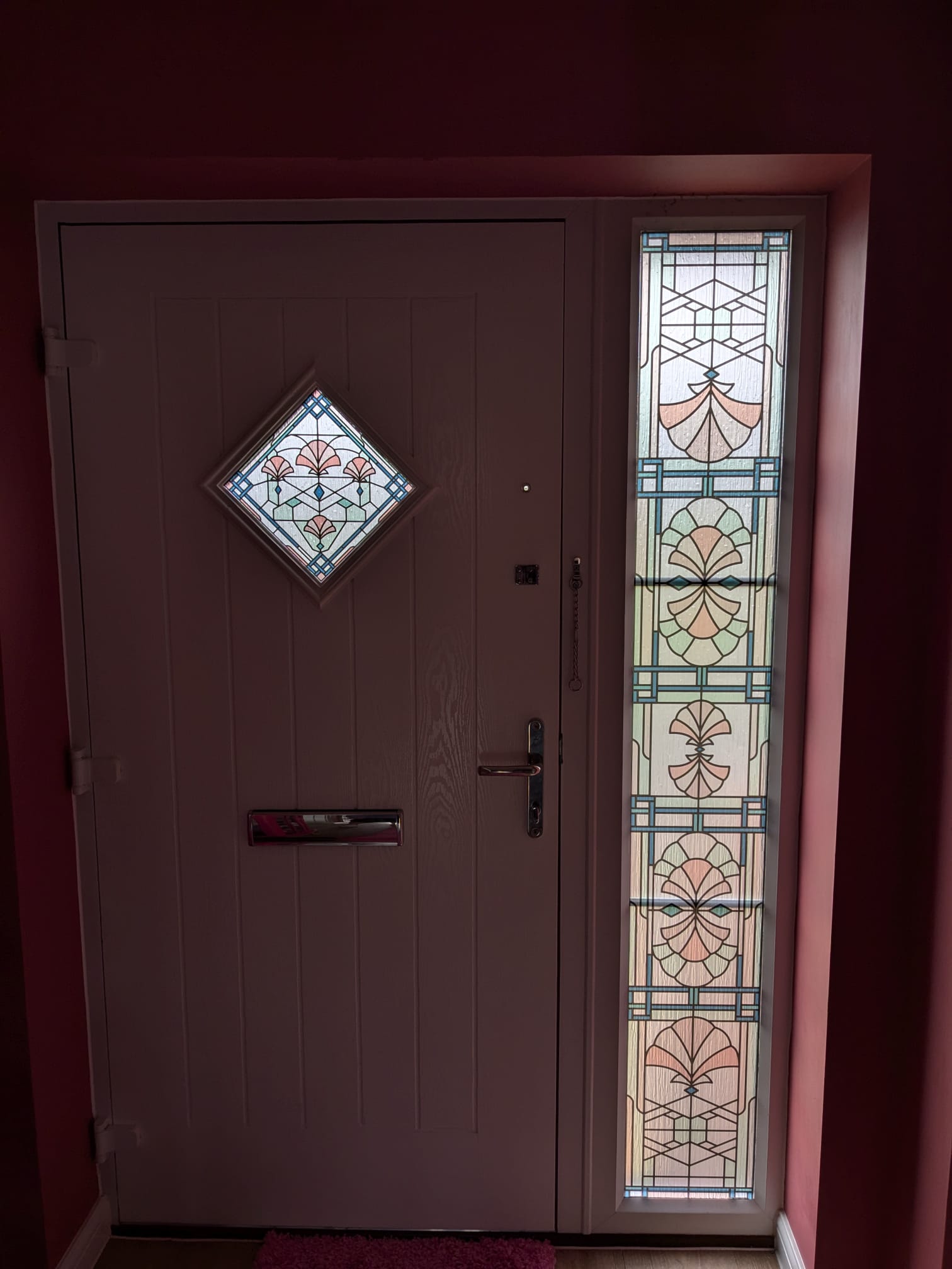 Beatrice stained glass window film for a diamond and tall window..jpg