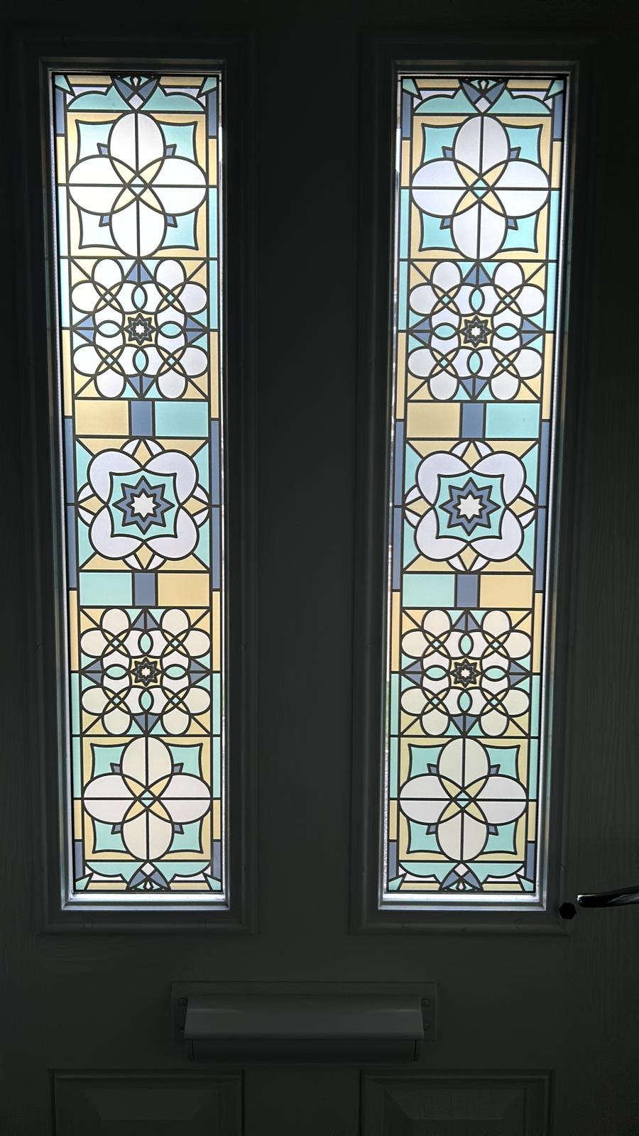 Zak stained glass film installed on a glass door.jpg